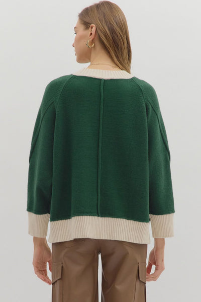 GREEN SWEATER WITH CREAM ACCENTS
