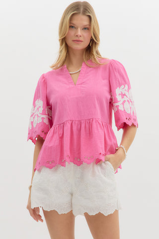 PINK PEPLUM WITH WHITE FLORAL DETAILS